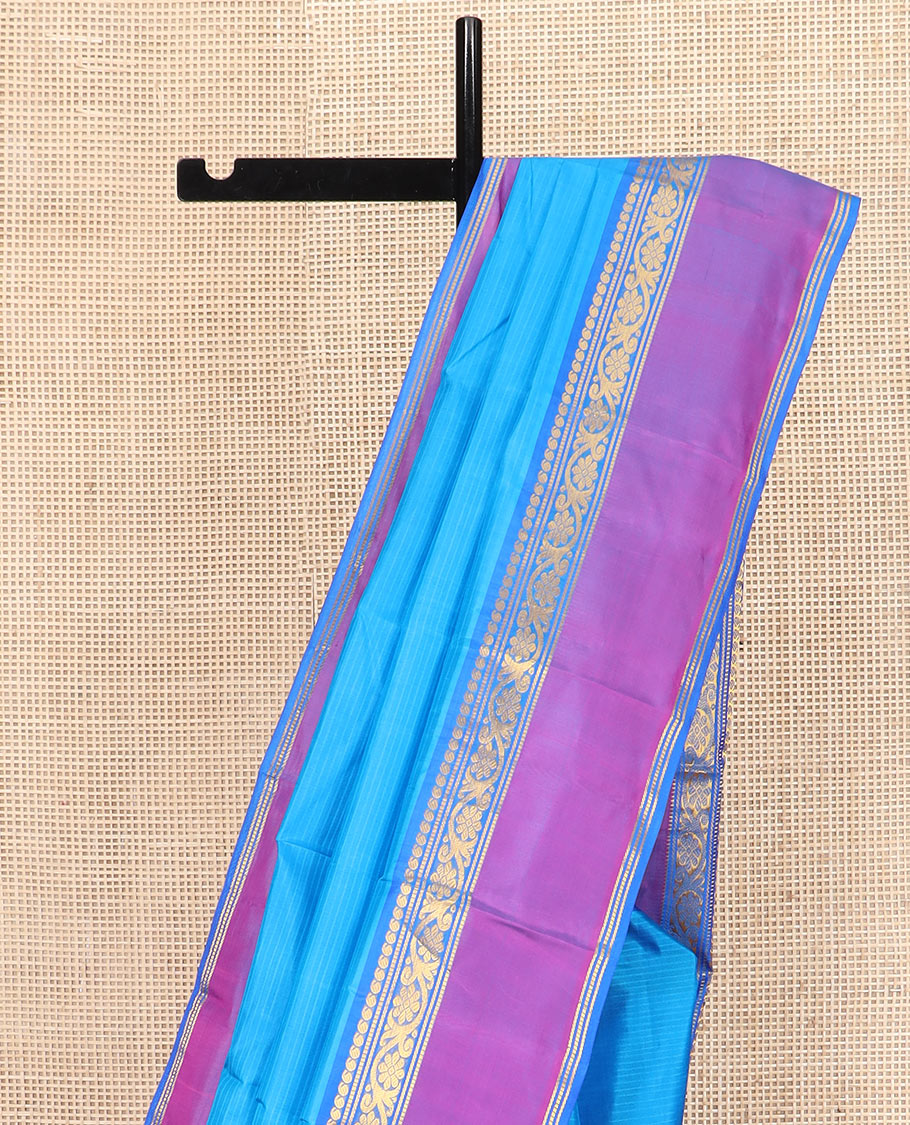 Blue Striped Kanchipuram Silk Saree Accentuated with Contrast Rettai Pettu Border Featuring Manga, Muthu, Banaras, and Kodi Visiry Designs, Subtly Woven Pallu with Stripes, and Paired with a Matching Blouse