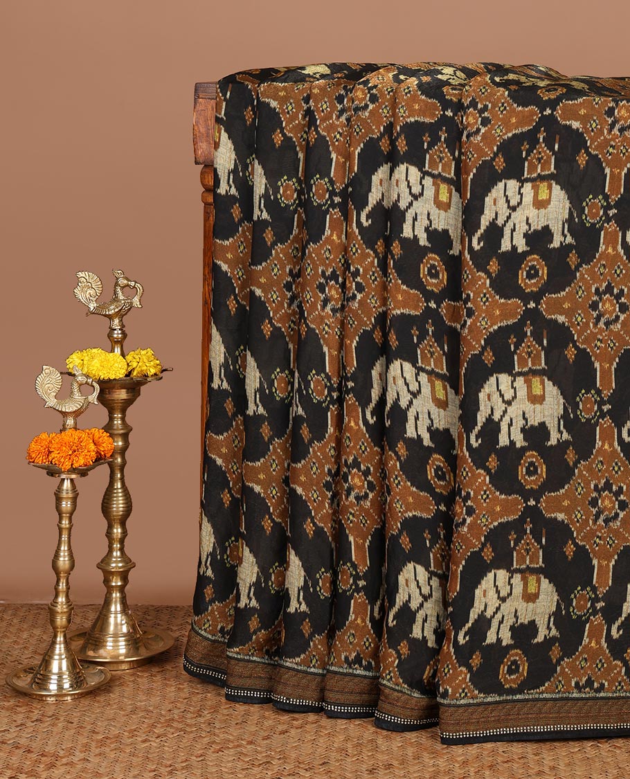 Black pochampally digital printed fendy crepe saree with swarovski stone, lace border & self pallu along with plain blouse