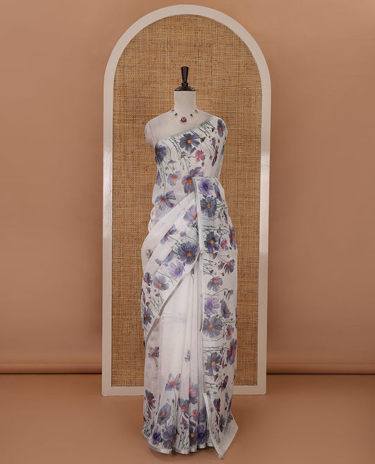 White-base poppy-style grey-color floral motifs printed linen saree, piping zari border, pallu steeped with floral print & floral matching blouse