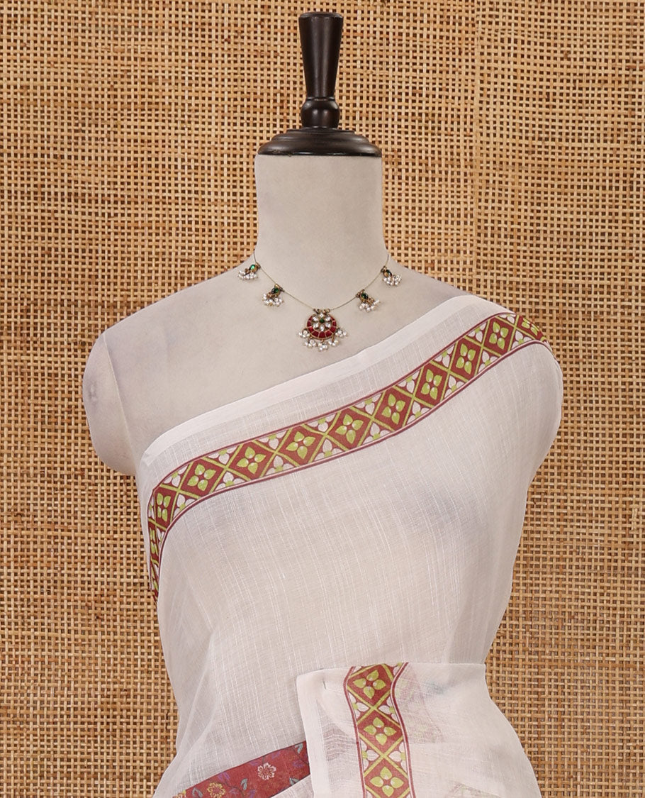 White half-plain & half-printed linen cotton saree, maroon-color diamond-patterned border, kalamkari-style flora-fauna printed pallu & diamond jaal printed blouse