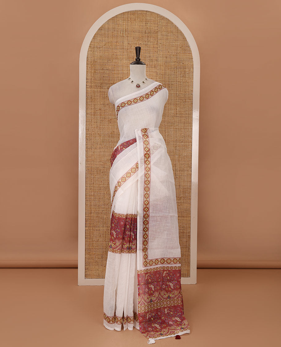 White half-plain & half-printed linen cotton saree, maroon-color diamond-patterned border, kalamkari-style flora-fauna printed pallu & diamond jaal printed blouse