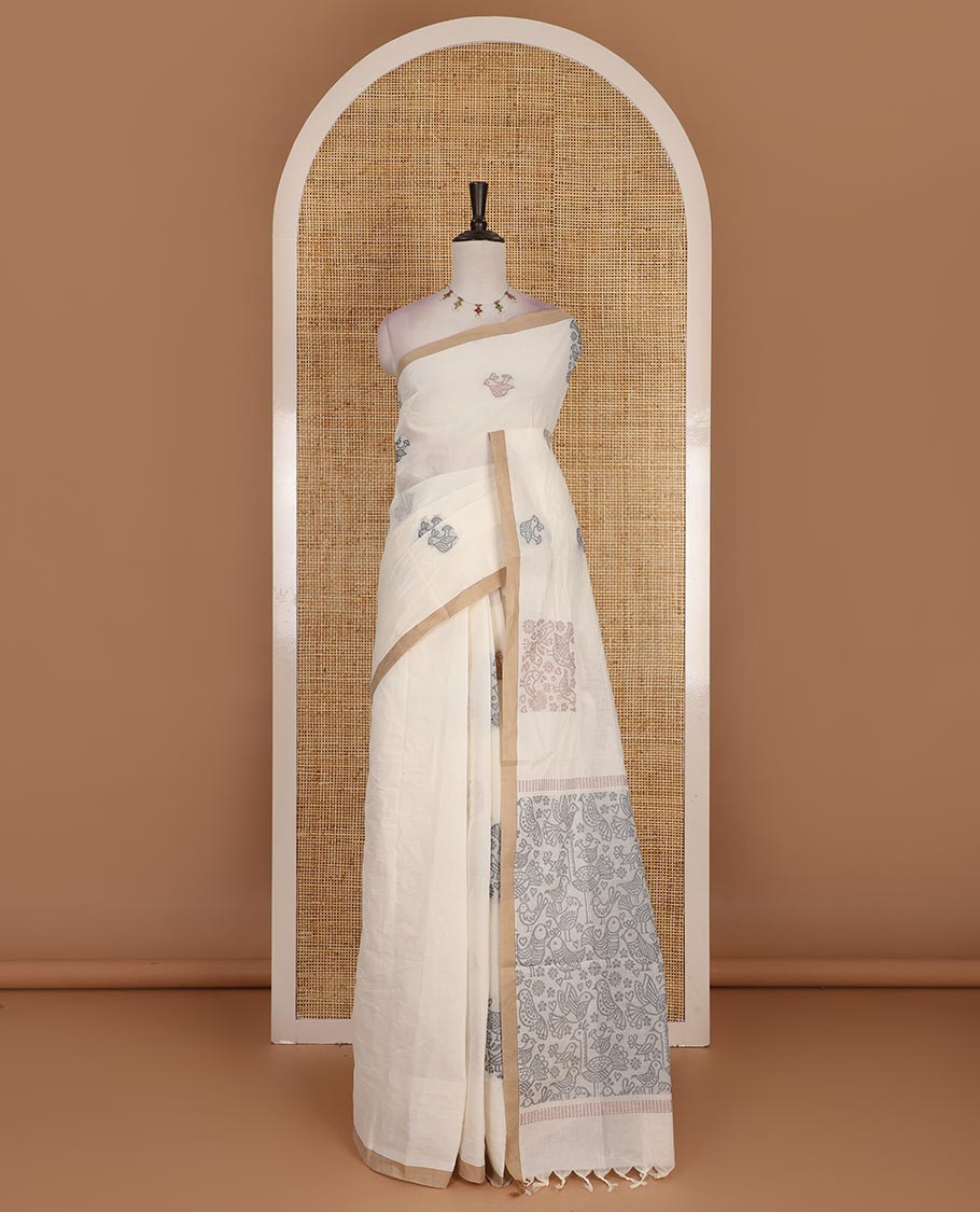 Cream bird motifs printed Handloom cotton saree, contrast piping border, pallu of bird motifs print, and a matching blouse