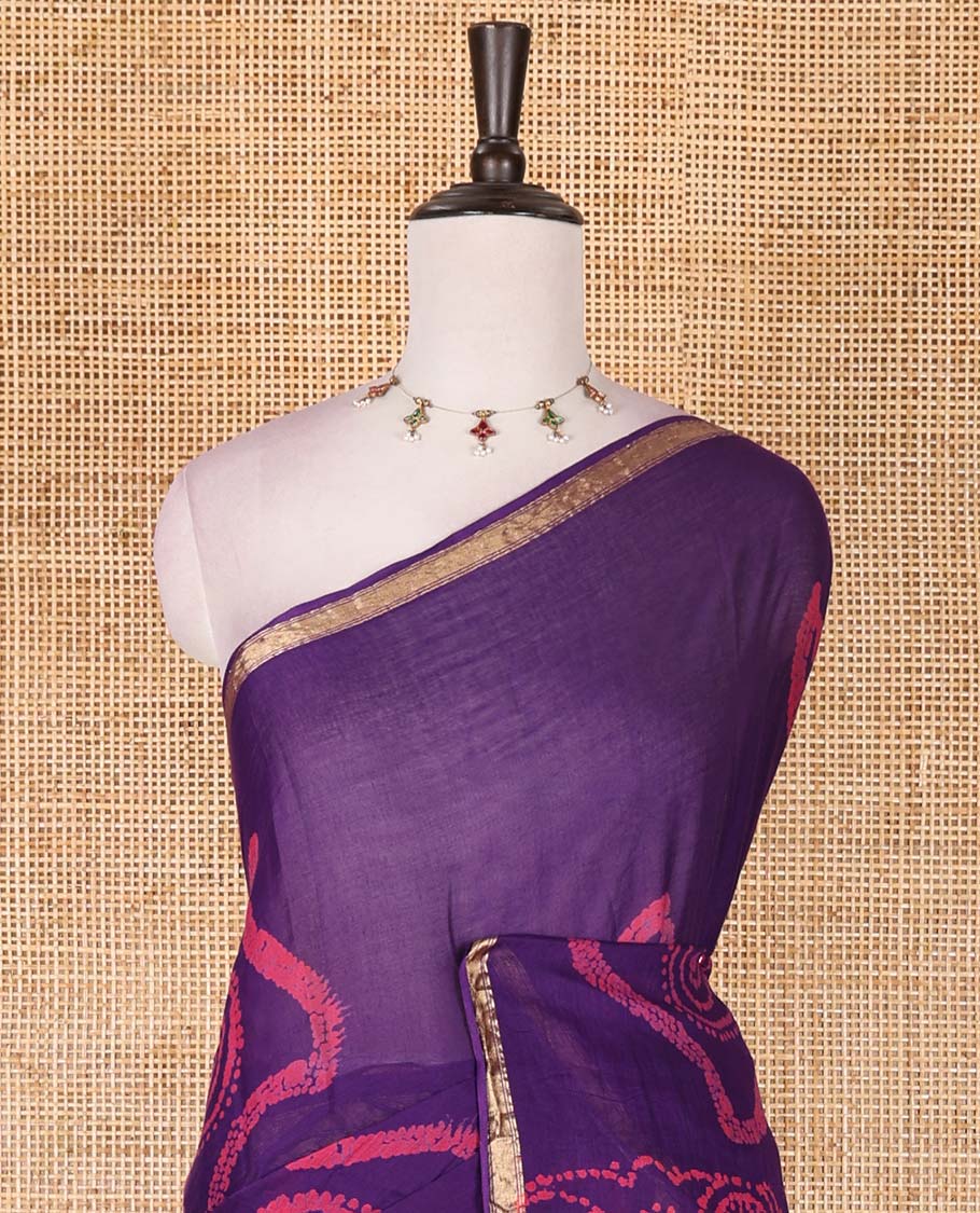 Purple batik geometric printed pure cotton saree, zari piping border, human figurines batik printed pallu, and a matching batik printed blouse