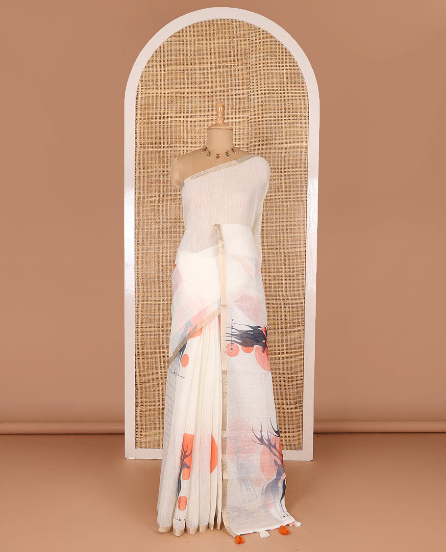 Cream sun and deer silhouette printed linen cotton saree, gold zari piping border, printed pallu, and a matching stripes printed blouse