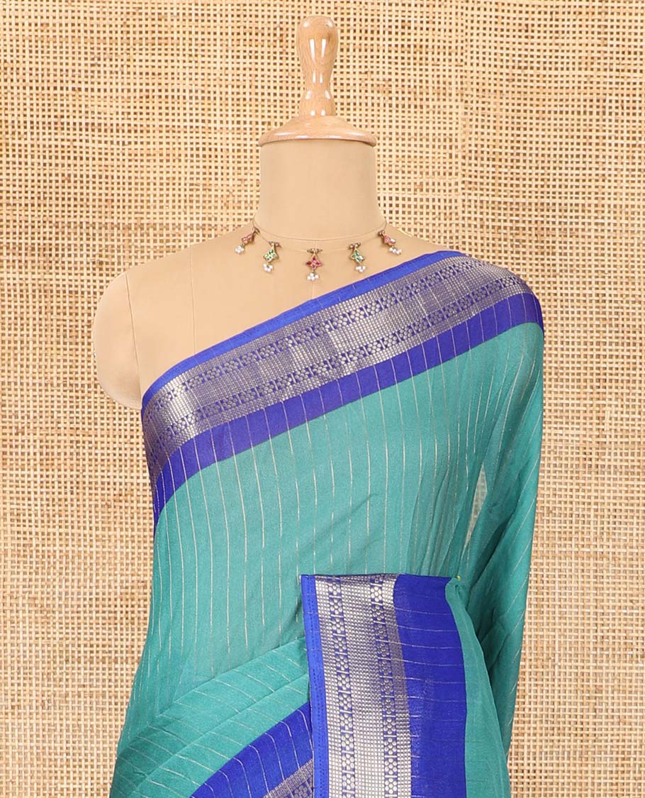 Rama vertically striped moss chiffon saree with contrast traditional zari design borders, striped pallu, and a contrast blouse
