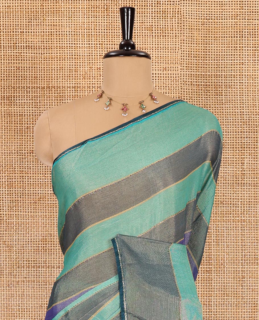 Rama horizontal striped fendy chiffon saree, piping border, striped palu, and blouse of sequins and zari buttas