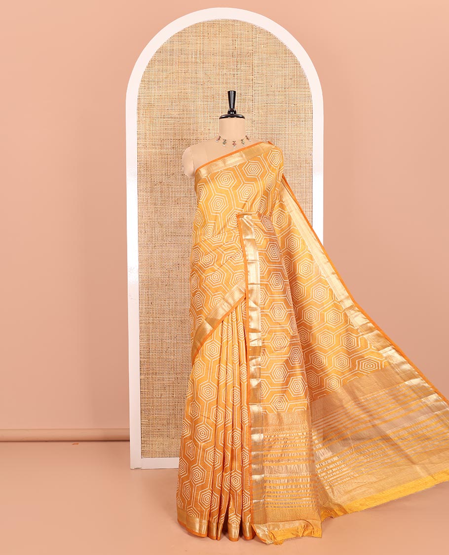 Mustard Semi-Tussar Saree Subtly Sparked with Hexagonal Geometric Patterns Printed All Over Its Body, Featuring Traditional Zari Design Border, Gleaming Zari Striped Pallu, and a Matching Blouse