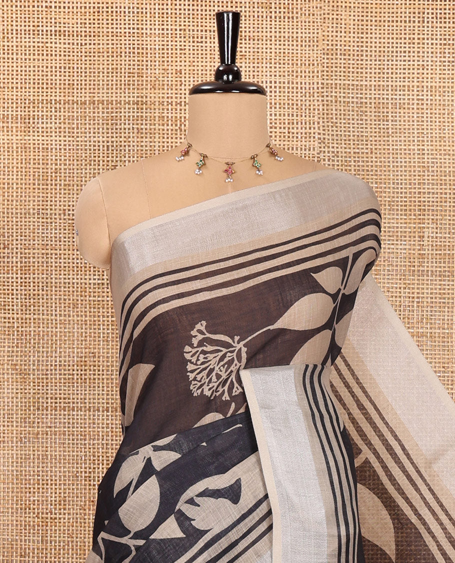 Black Linen Cotton Saree, Beautified with Floral Leaf Motifs Printed on Its Body, Subtle Bavanji Border, Pallu Features Floral Print and Stripes, and Paired with a Matching Blouse