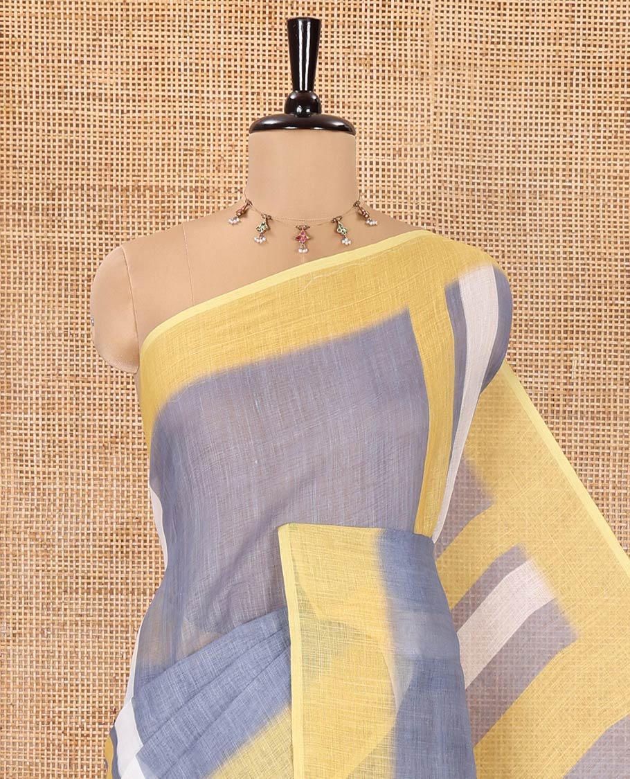 Grey Linen Saree, Subtly Sparkled with Stripes on Its Body, Complemented by a Contrast Border, Subtly Striped Pallu, and Comes with a Contrast Blouse