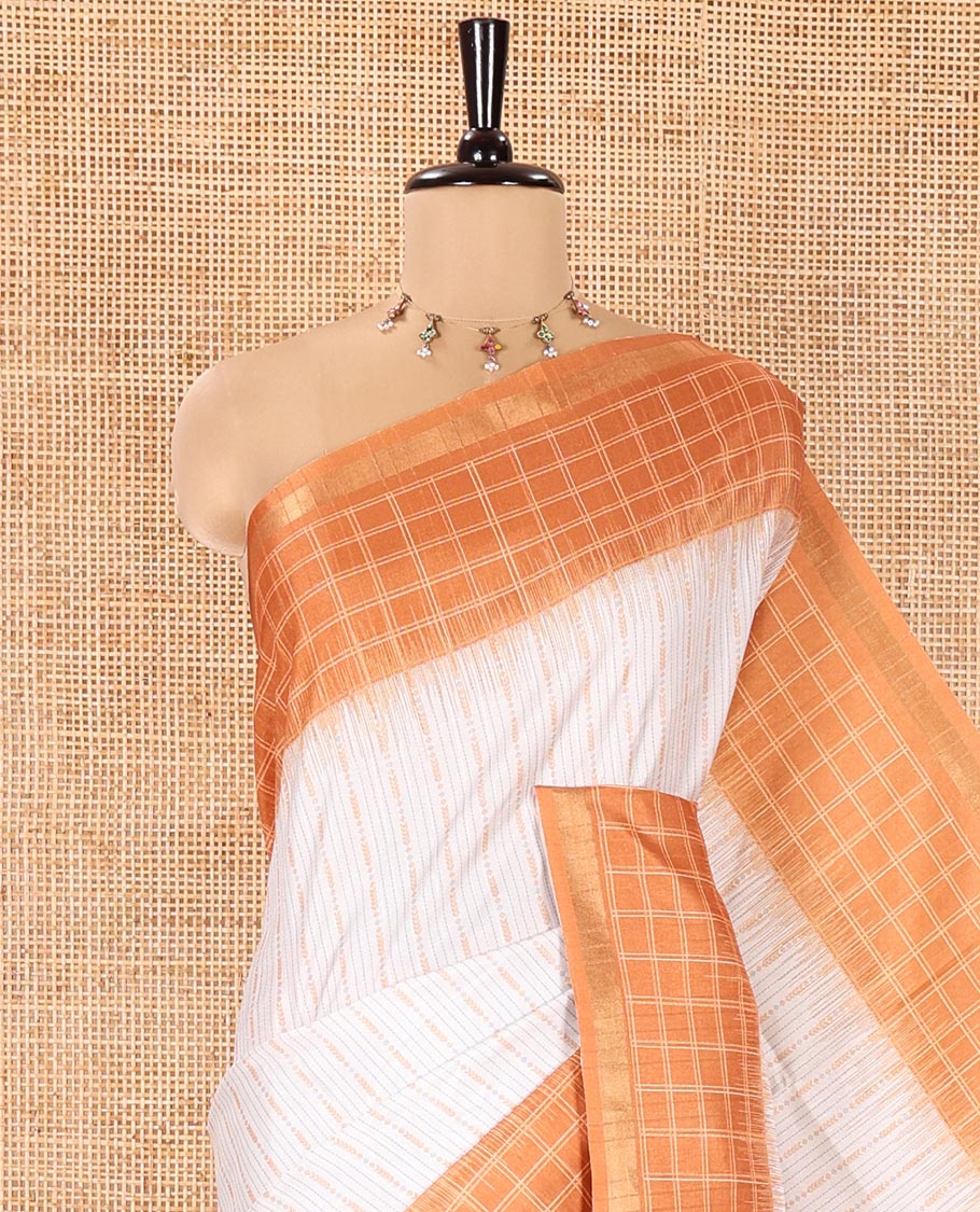 Half-White Katan Silk Saree, Accentuated with Vaira-Oosai-Style Stripes on Its Body, Complemented by a Contrast-Checked Border, Pallu of Jaal Designs, and Paired with a Contrast Blouse