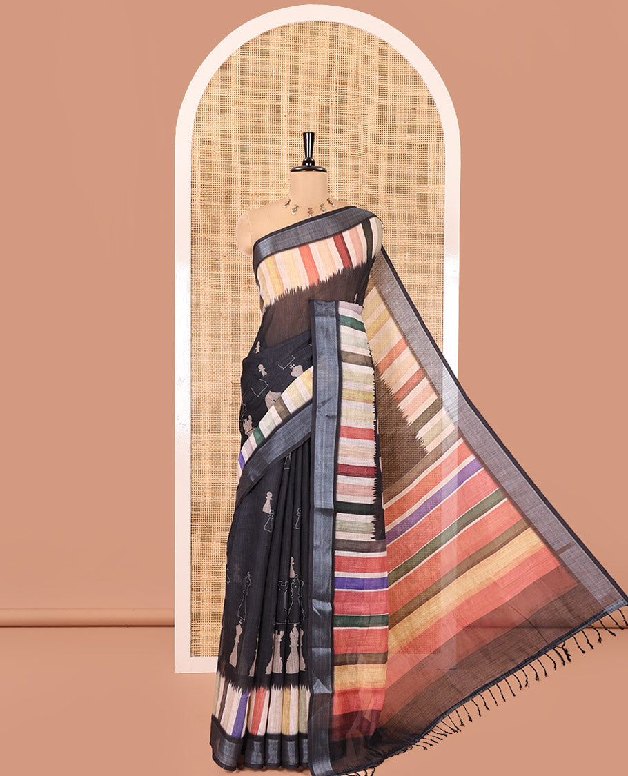 Black Linen Cotton Saree, Creatively Printed with Chess Coin Motifs on Its Body, Highlighted by a Zari Border of Multi-Color Stripes, Pallu Steeped with Multi-Color Stripes, and Paired with a Contrast Blouse