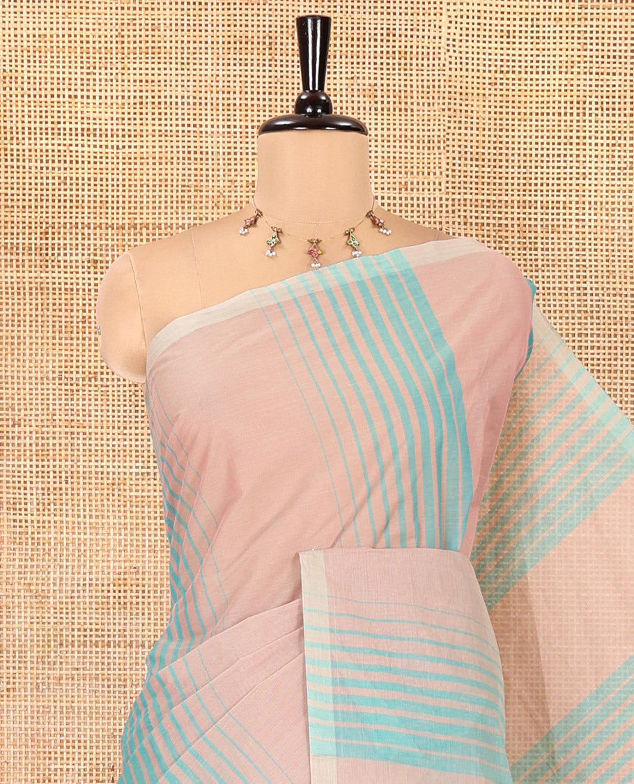 Borderless Rama Negamam Cotton Saree, Subtly Sparkled with Stripes All Over Its Body, a Self-Pallu, and Paired with a Matching Blouse