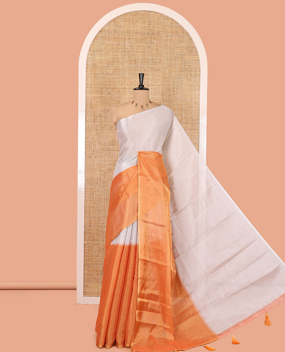 Borderless Orange Plain Tissue Saree, a Self-Pallu with Tassels, and a Matching Blouse
