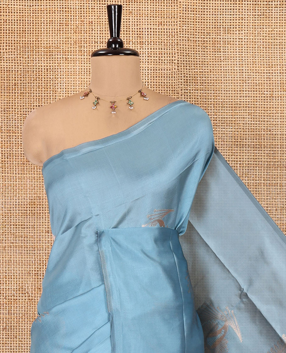 Borderless Sky Blue Kanchi Silk Saree, Elegantly Highlighted with Zari Buttas, Intricate Pallu, and a Matching Blouse