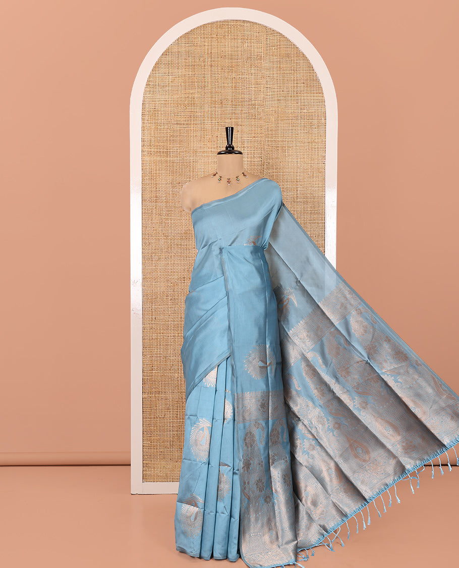 Borderless Sky Blue Kanchi Silk Saree, Elegantly Highlighted with Zari Buttas, Intricate Pallu, and a Matching Blouse
