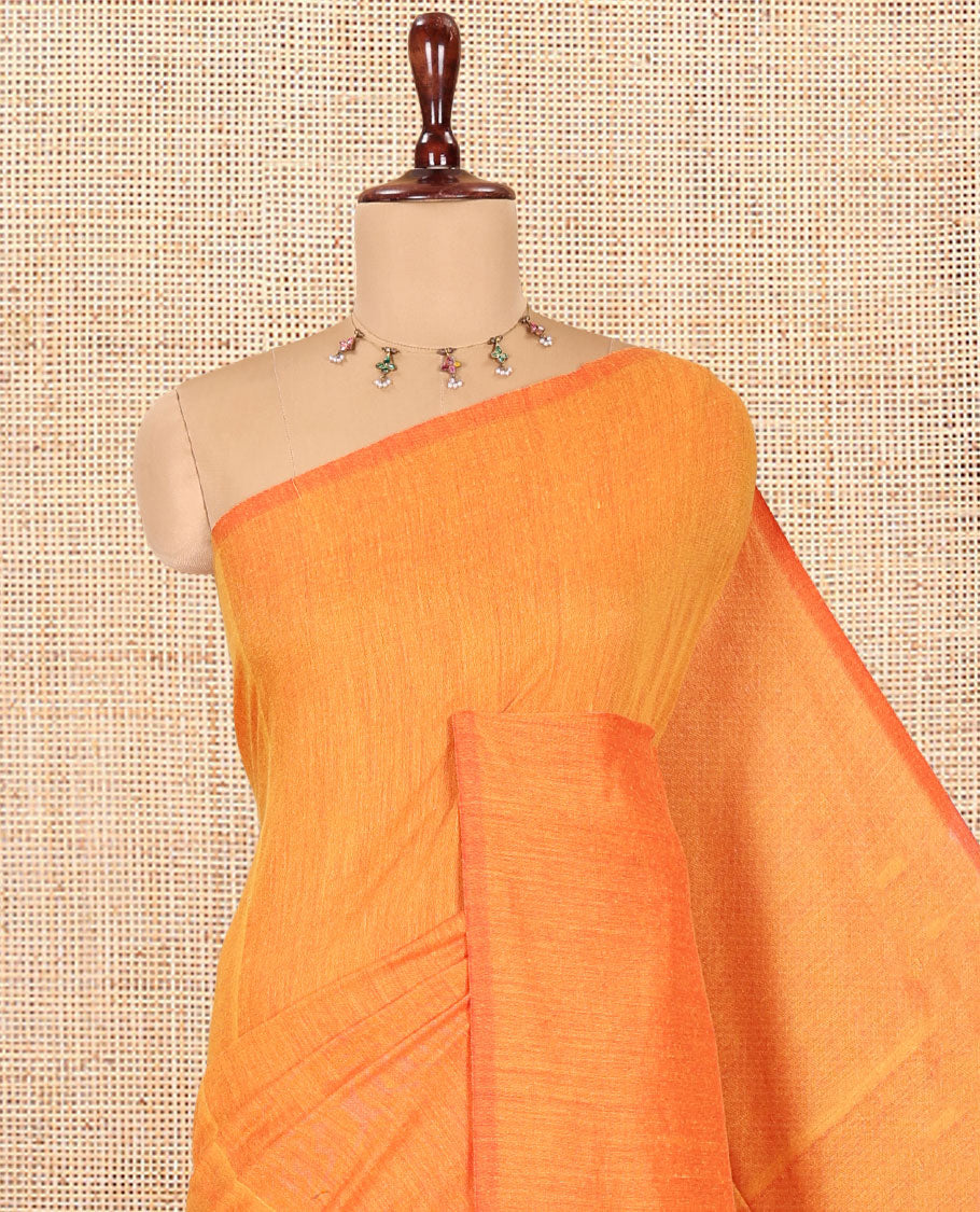 Borderless Orange Plain Khadi Cotton Saree, a Self-Pallu with Tassels, and a Matching Blouse