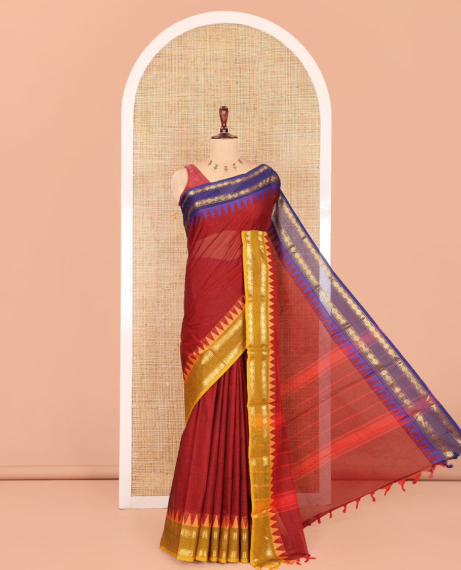 Maroon Plain Chettinad Cotton Saree, Complemented by a Contrast Rettai Pettu Rudraksham Temple Border, Striped Pallu, and Matching Blouse