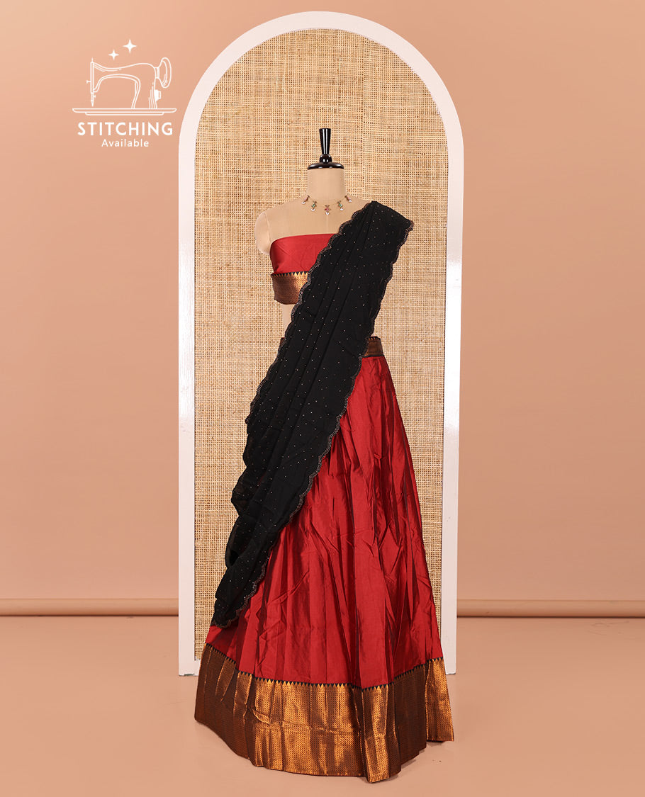 Maroon Taffeta Silk Half-Saree Featuring a Plain Skirt, Complemented by a Contrast Traditional Zari Design Border, Paired with a Matching Blouse, and a Georgette Scallop-Bordered Stone Work Dhavani