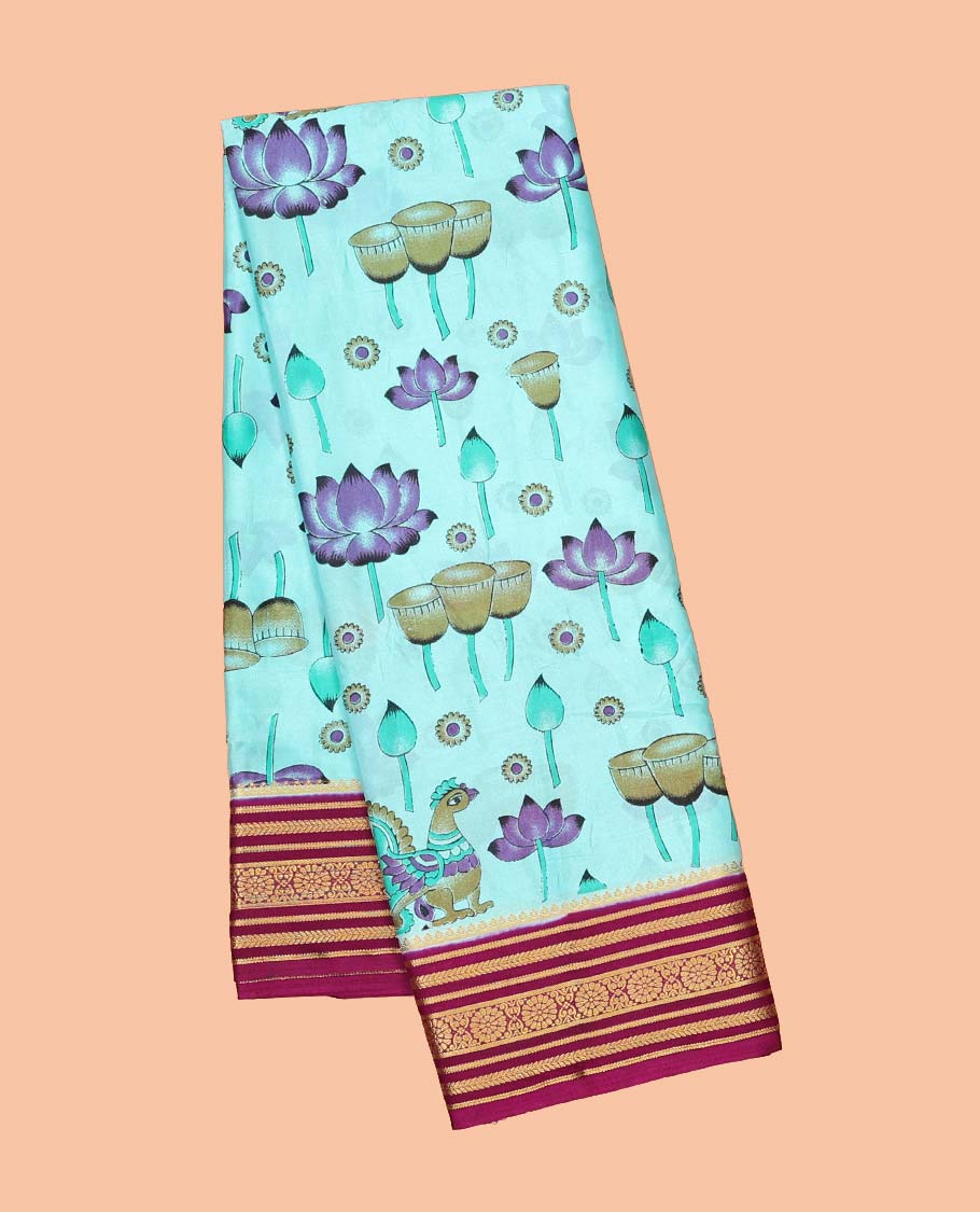 Blue kalamkari-style lotus & peacock semi-banaras printed saree, contrast traditional design border & striped pallu