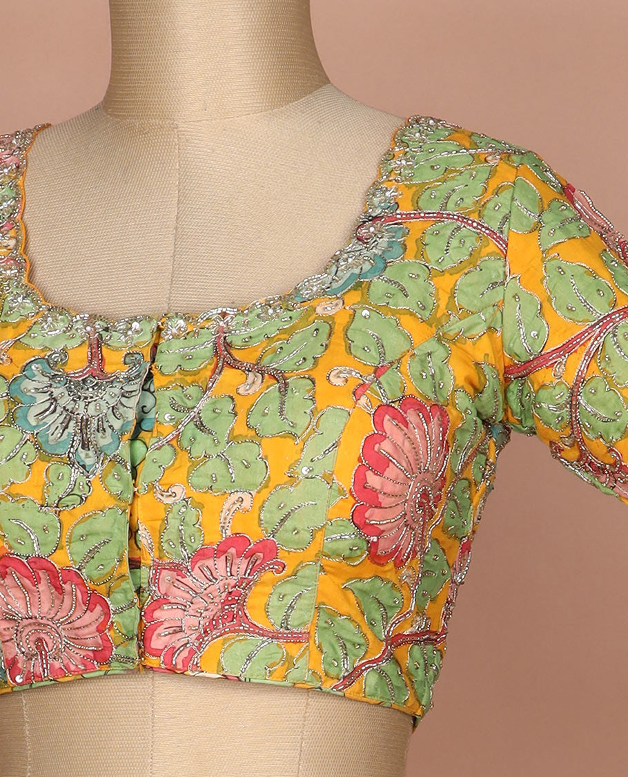 Yellow kalamkari floral vine handbrush painted with mixed embroidered elbow sleeve cotton readymade blouse