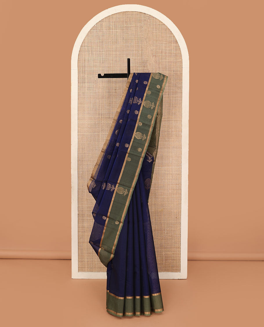 Blue floral zari buttas silk cotton saree, contrast zari buttas border and pallu of intricate Mughal style ogee patterns weave
