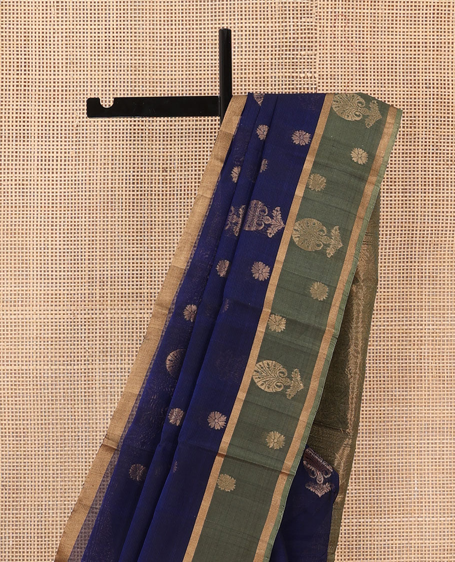 Blue floral zari buttas silk cotton saree, contrast zari buttas border and pallu of intricate Mughal style ogee patterns weave
