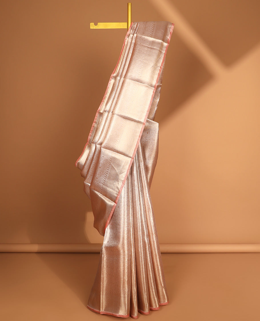 Light pink intricate floral design semi tissue saree with self striped border & zari design pallu