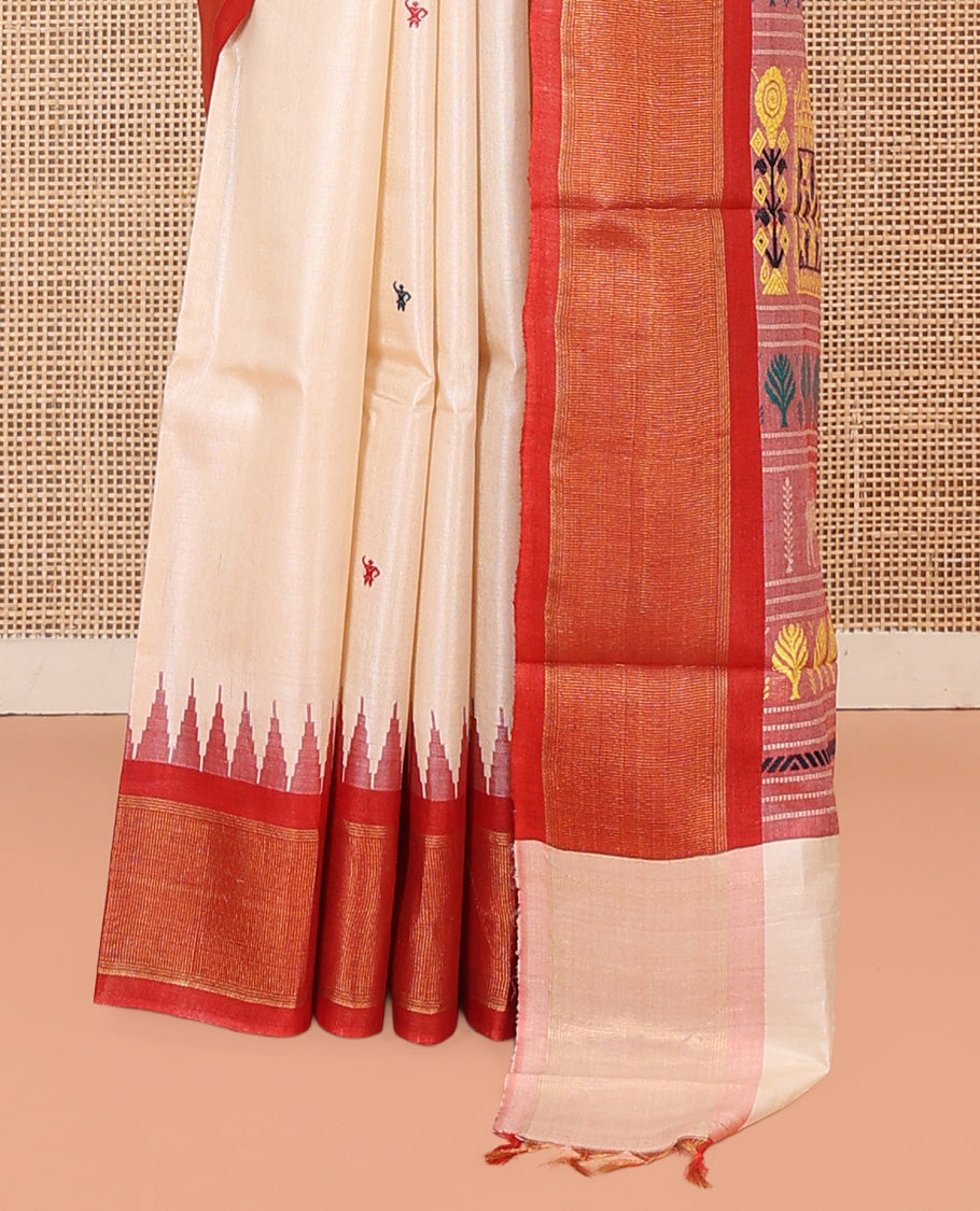 Sandal Tussar Saree, Finely Crafted with Warli Buttas, a Contrast Temple Border, Warli-Themed Thread-Woven Pallu, and a Contrast Blouse