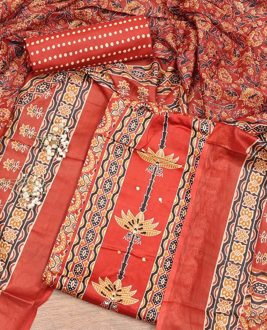 Orange Material Chudidar Set, Artfully Detailed with Ajrakh Printed Cotton Top, Complemented by Printed Cotton Bottom, and Paired with Floral Printed Cotton Dupatta