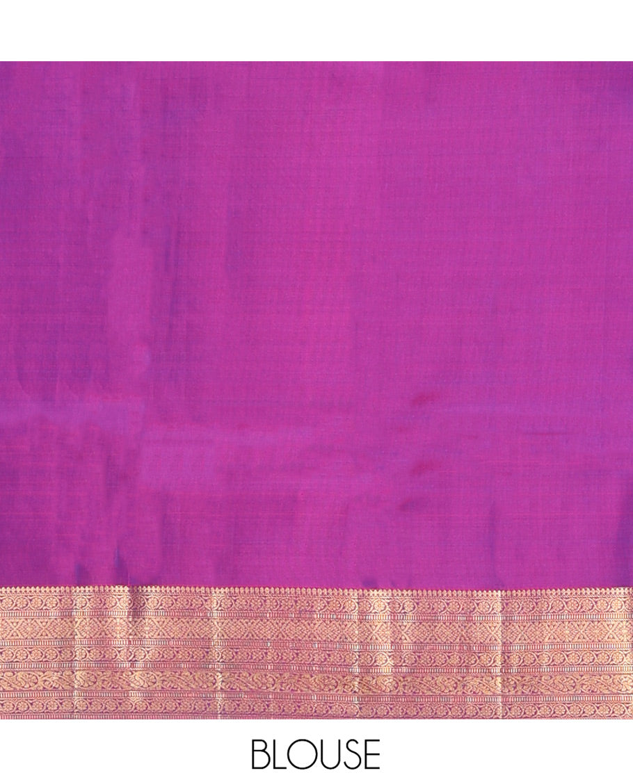 Blue Vasundhara Lite-Silk Mix Saree, Adorned with Zari Buttas, Complemented by Contrast Border Featuring Thilakam Mokku, Kodi Visiry, Muthu, Laddu Kamalam, and Mayil Designs, Grandly Pallu of Scallop Designs, and Paired with a Contrast Blouse