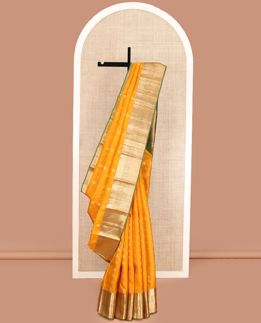 Yellow Vasundhara Lite Silk Mix Saree, Subtly Sparkled with Zari Buttas, Complemented by a Contrast Border of Thilakam Mokku, Muthu, Kodi Visiry, Diamond, and Kuyil Kann Designs, Beautifully Bedecked Pallu, and Paired with a Contrast Blouse
