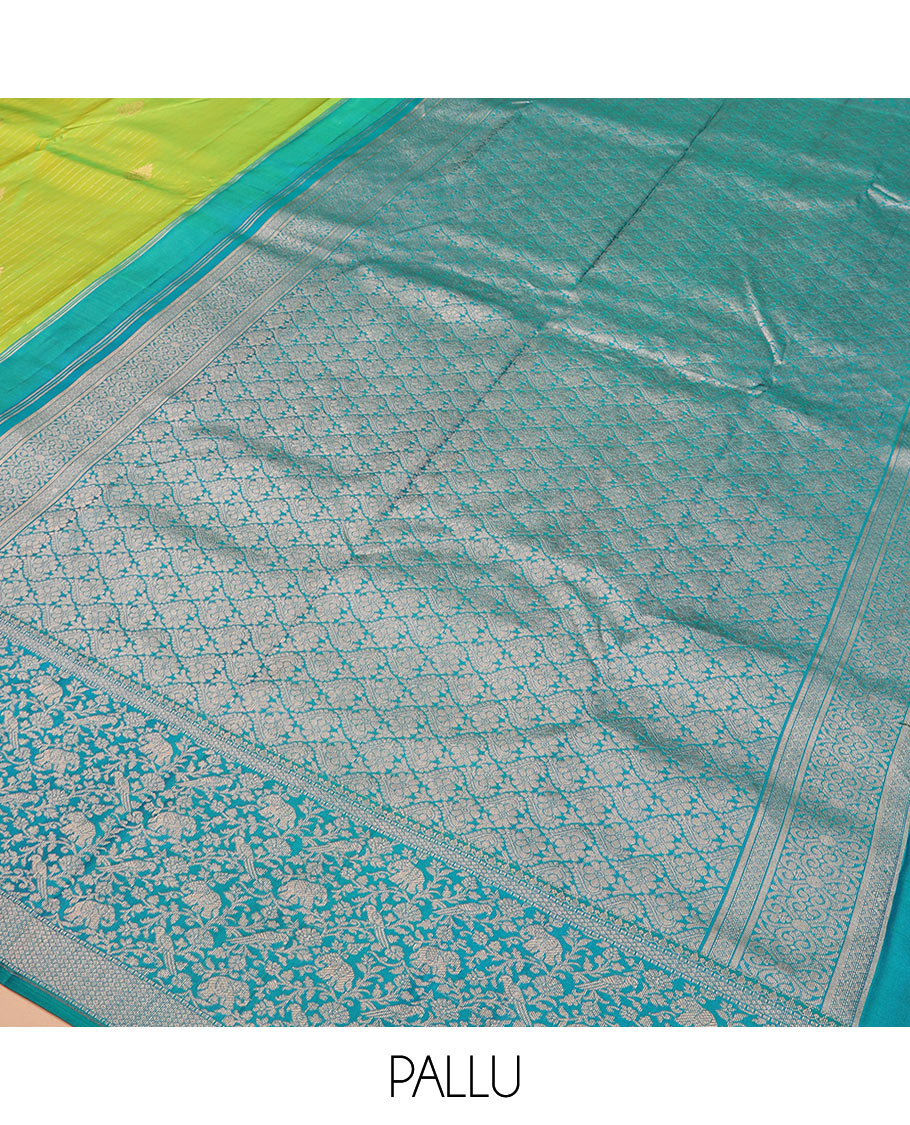 Green striped and zari buttas silk saree with contrast vanasingaram border of yaanai, killi, and kodi visiry designs, and jaal pallu