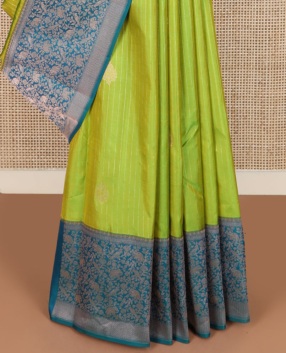 Green striped and zari buttas silk saree with contrast vanasingaram border of yaanai, killi, and kodi visiry designs, and jaal pallu