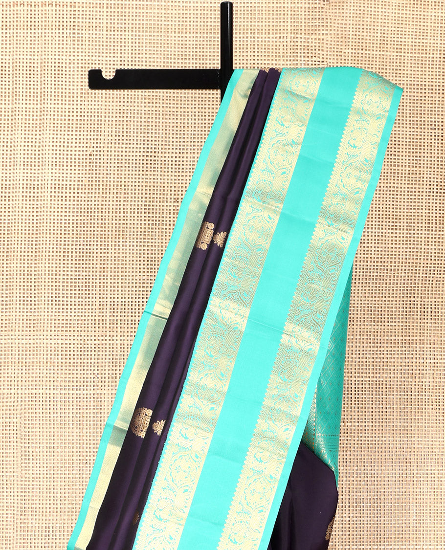 Eggplant Purple Vasundhara Silk Saree, Decorated with Zari Buttas, Complemented by a Contrast Rettai Pettu Mayil-Yaanai Border, Jaal Pallu, and a Contrast Blouse