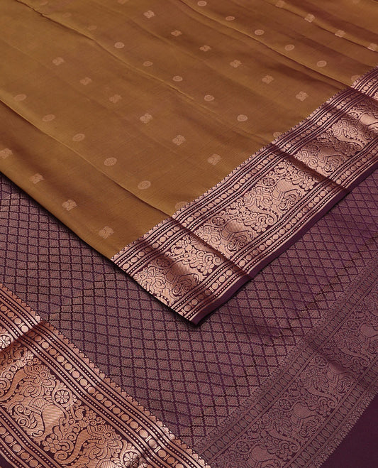 Brown mayil chakram zari buttas silk saree, contrast jaal pallu & border of paisa,muthu,banaras & yaali designs