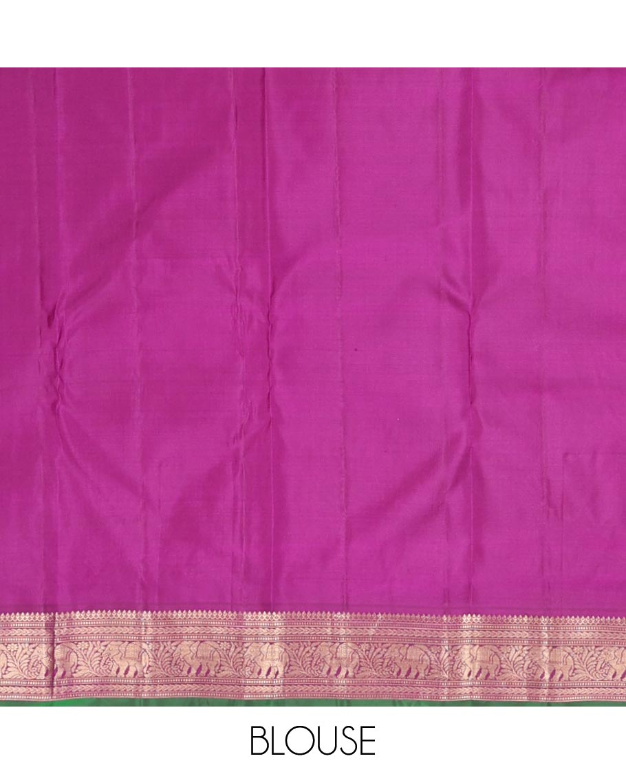 Green silk saree with box mayil and chakram buttas, contrast border of thilakam mokku,muthu,kathir & yaanai designs & jaal pallu