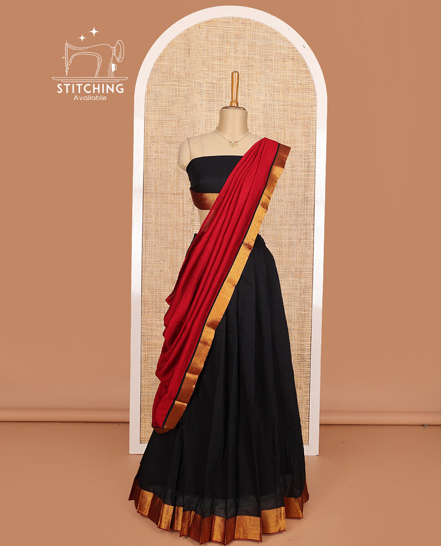 Black cotton half-saree, plain with contrast zari bordered skirt, matching blouse, and contrast zari border dhavani