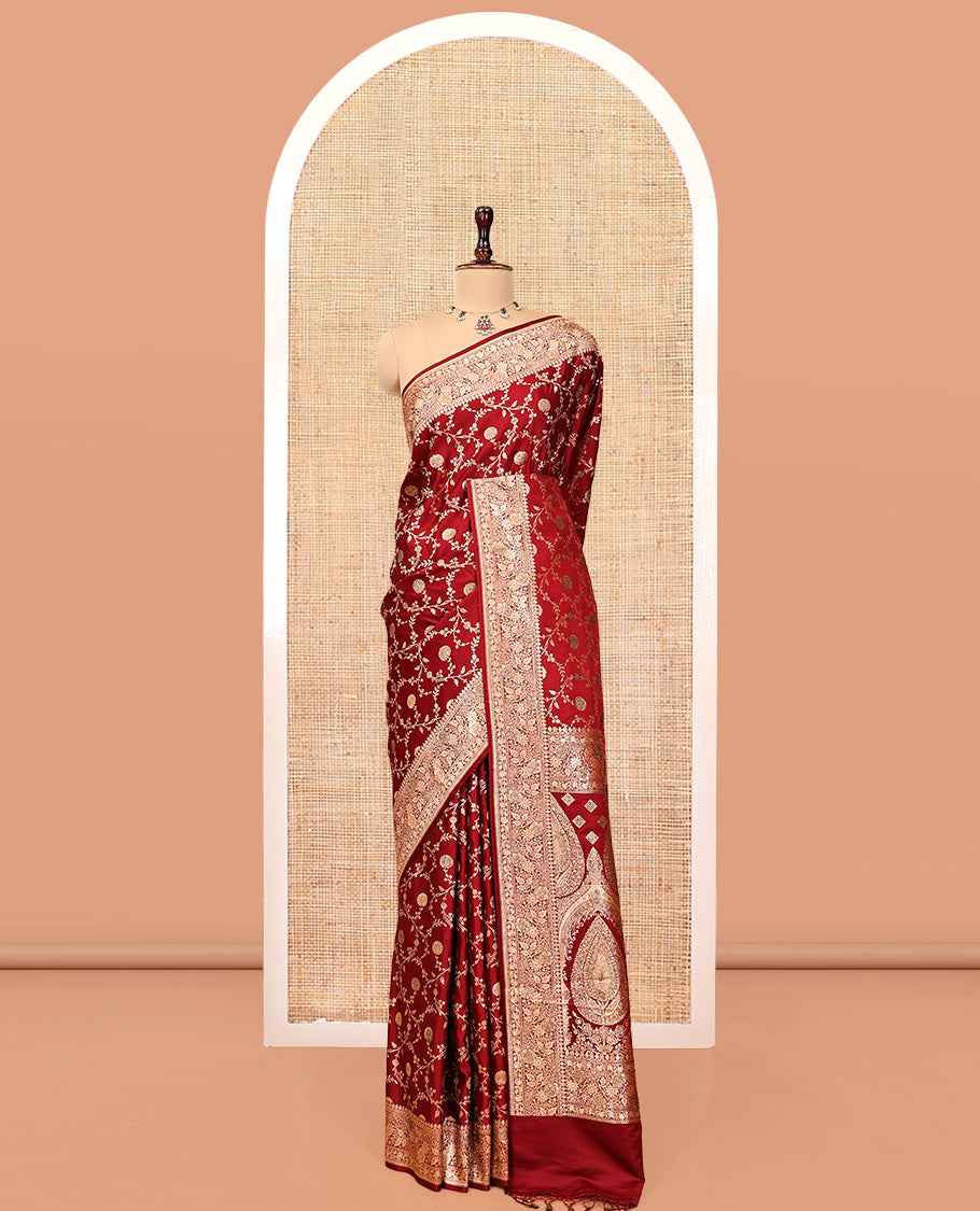 Red Banarasi Satin Saree, Gracefully Embellished with Floral Jaal Jacquard, a Floral Creeper Border, Intricate Stonework Pallu, and a Matching Blouse