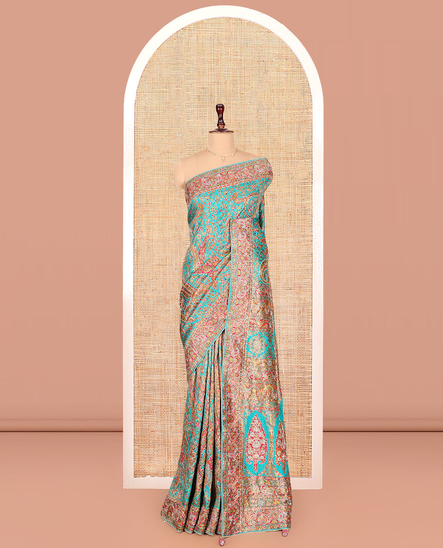 Blue Dola Silk Saree, Beautifully Bedecked with Colorful Floral-Paisley Design on Its Body, Complemented by Contrast Paisley Border, Pallu of Mughal-Style Design, and Paired with a Matching Blouse