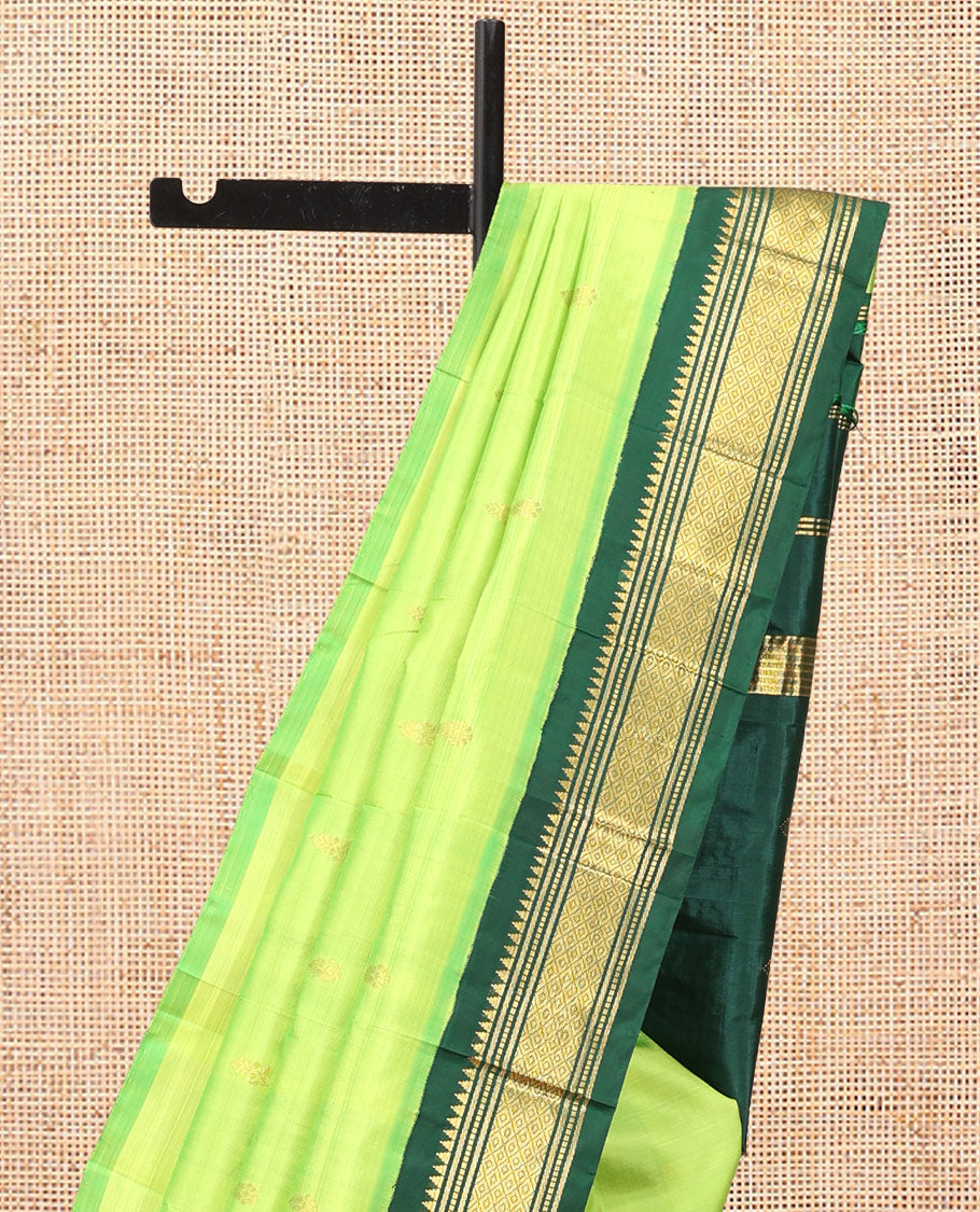 Green Kanchipuram Silk Saree, Subtly Woven with Zari Buttas, Complemented by a Contrast Korvai Border of Rekku, Banaras, Muthu, and Mayil Kann Design, Zari Design Pallu, and No Blouse