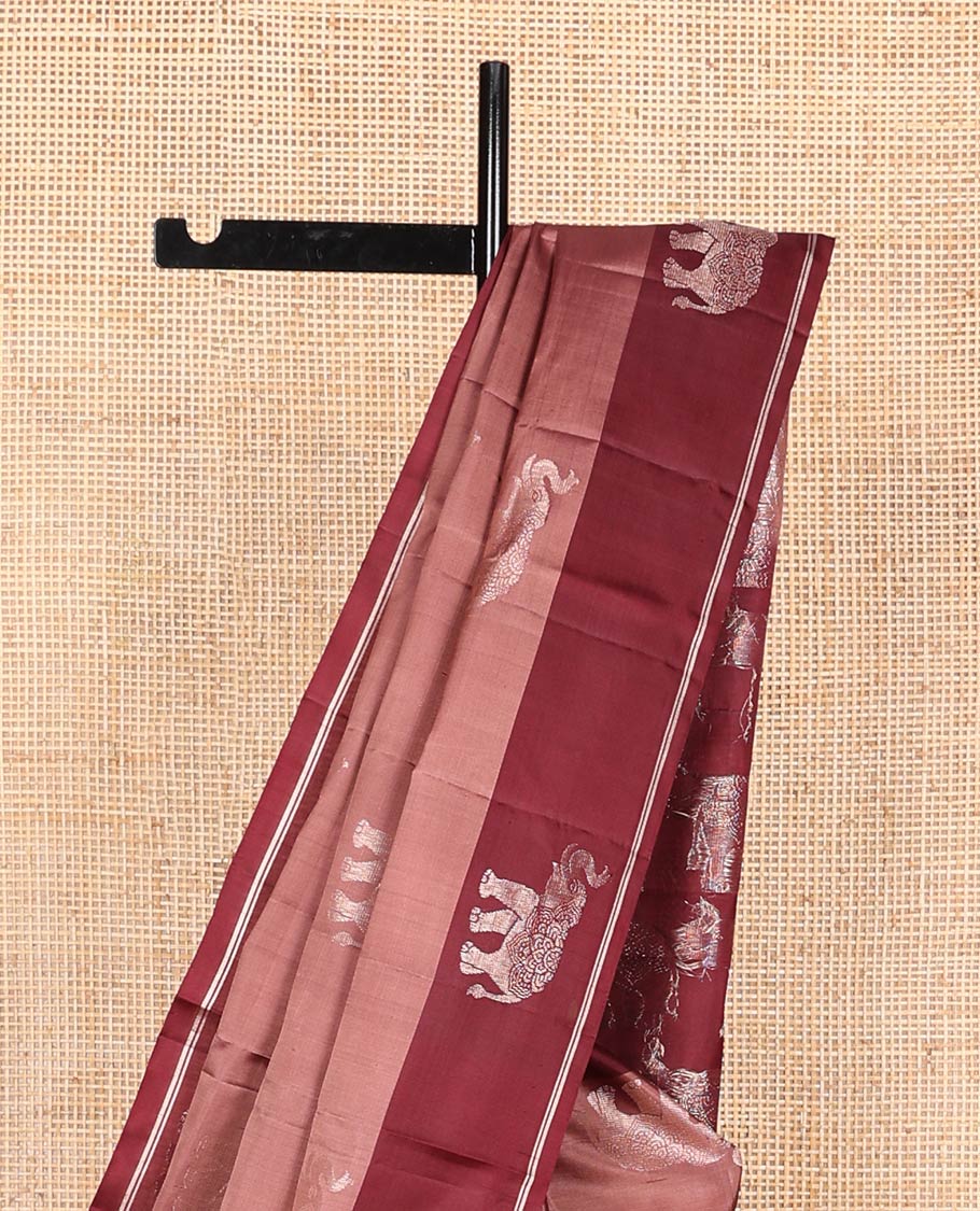 Brown elephant buttas soft silk saree, contrast elephant buttas border, and pallu steeped with elephant buttas