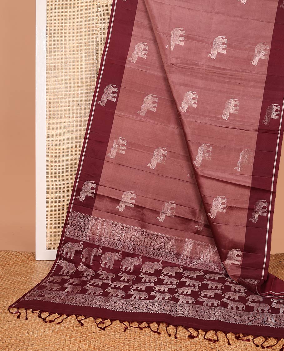 Brown elephant buttas soft silk saree, contrast elephant buttas border, and pallu steeped with elephant buttas
