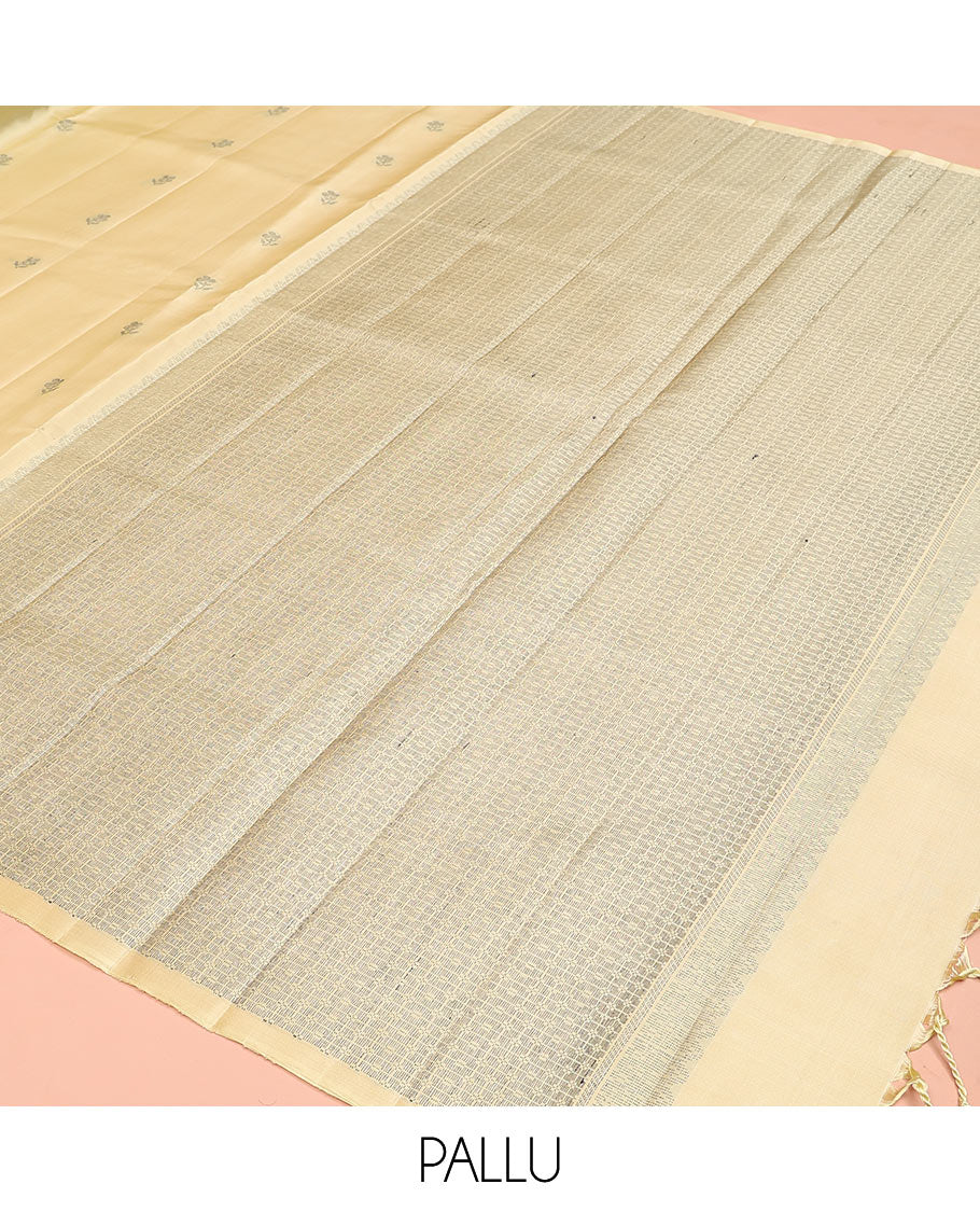 Pastel yellow floral buttas soft silk saree, floral-bird design border, and intricately designed pallu