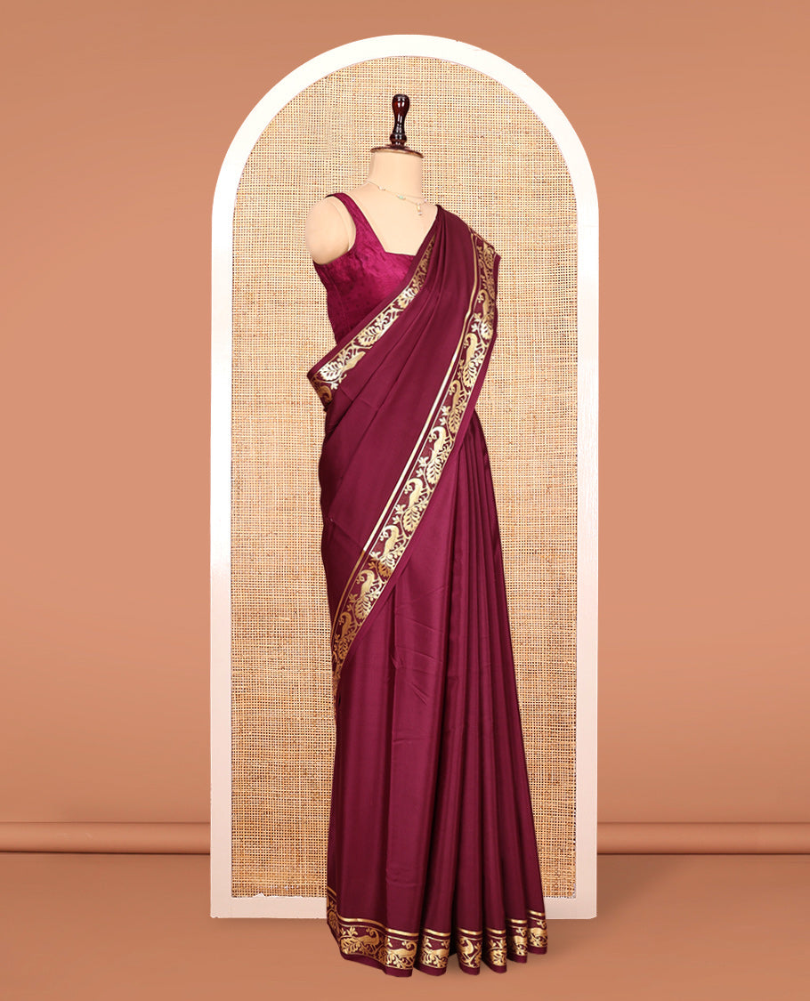 Maroon Plain Mysore Silk Saree, Highlighted by Zari Traditional Border of Peacock Designs, Pallu Steeped with Zari Stripes, and Paired with a Matching Blouse