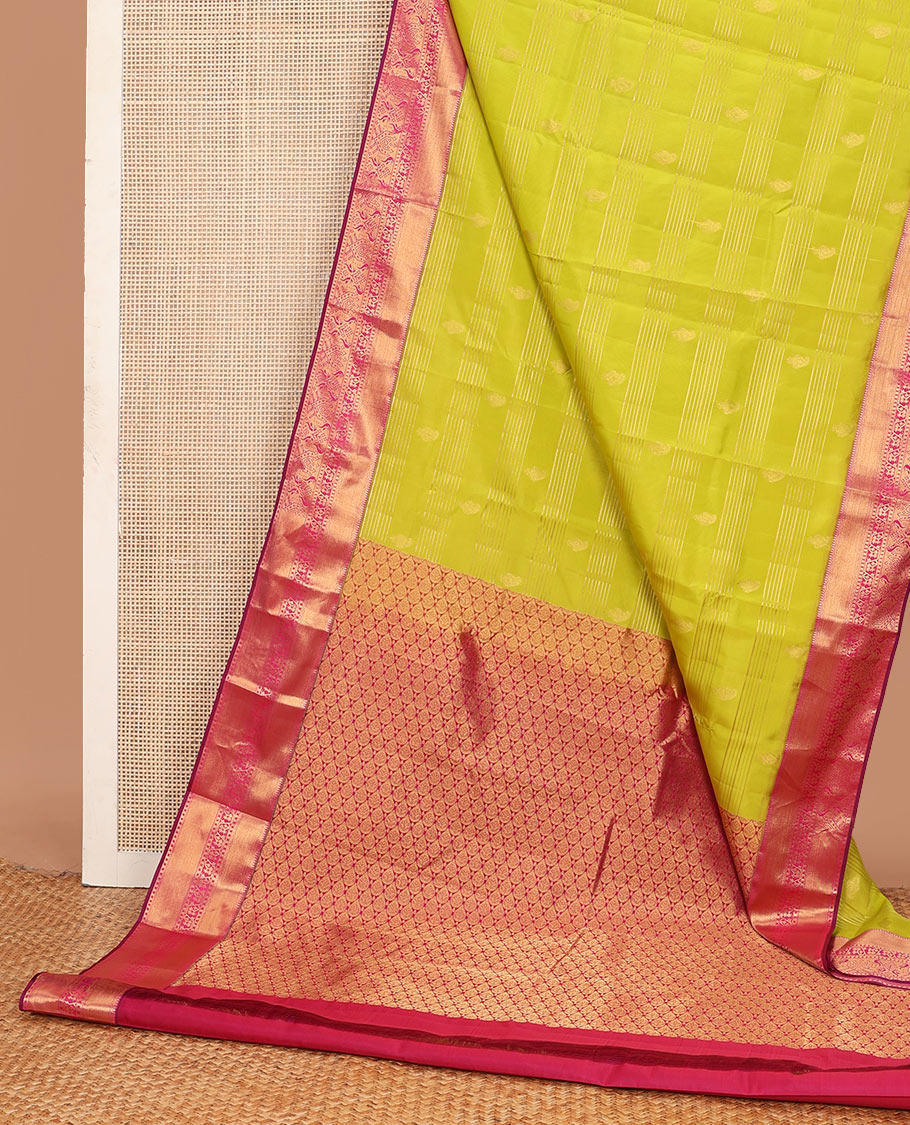 Yellow zari stripes & manga buttas Vasundhara silk mix saree, contrast paithani-style zari border & thilakam motifs steeped pallu
