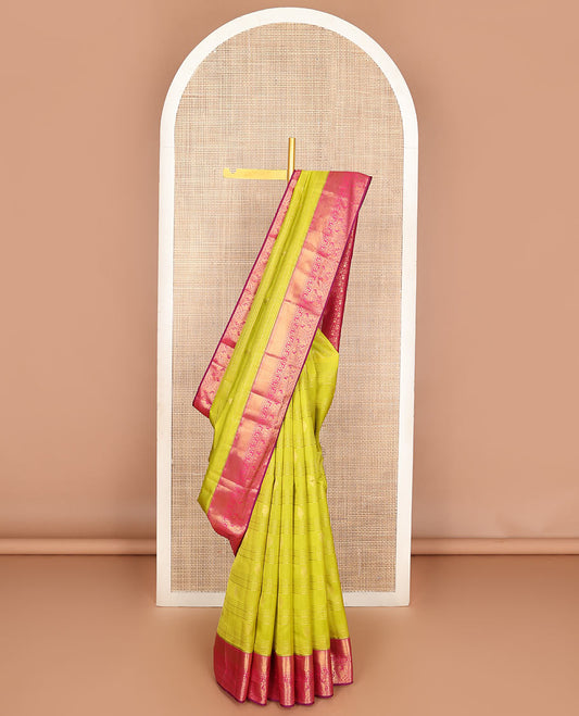 Yellow zari stripes & manga buttas Vasundhara silk mix saree, contrast paithani-style zari border & thilakam motifs steeped pallu