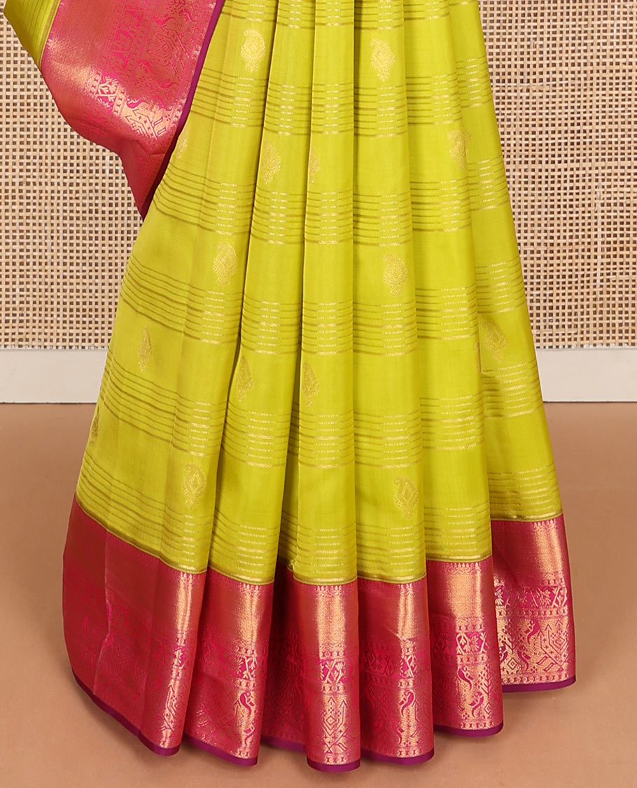Yellow zari stripes & manga buttas Vasundhara silk mix saree, contrast paithani-style zari border & thilakam motifs steeped pallu