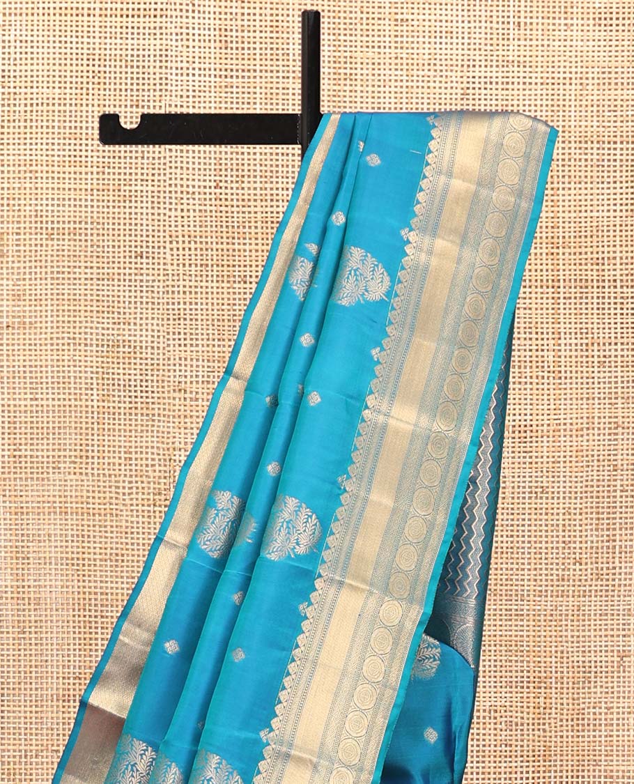 Blue Vasundhara Silk Mix Saree, Detailed with Zari Buttas All Over Its Body, Highlighted by Zari Border of Diamond and Chakram Designs, Grand Vanki Design Pallu, and Paired with a Matching Blouse