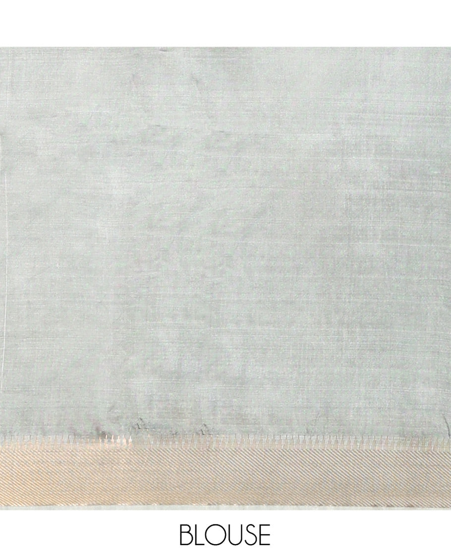 Grey Banana Pith Saree Elevated with Zari Buttas, Temple Border of Zari Designs, Subtle Pallu of Zari Designs, and Paired with a Matching Blouse