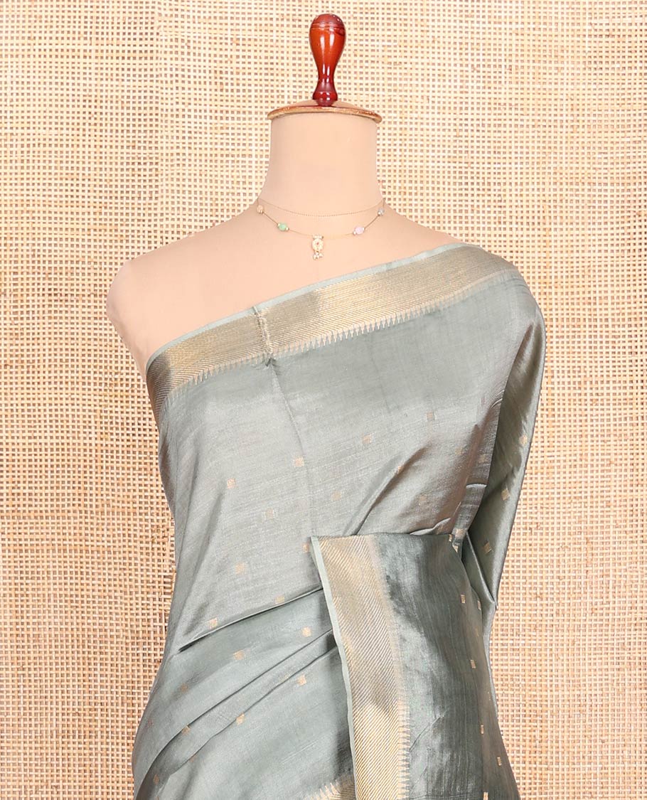 Grey Banana Pith Saree Elevated with Zari Buttas, Temple Border of Zari Designs, Subtle Pallu of Zari Designs, and Paired with a Matching Blouse
